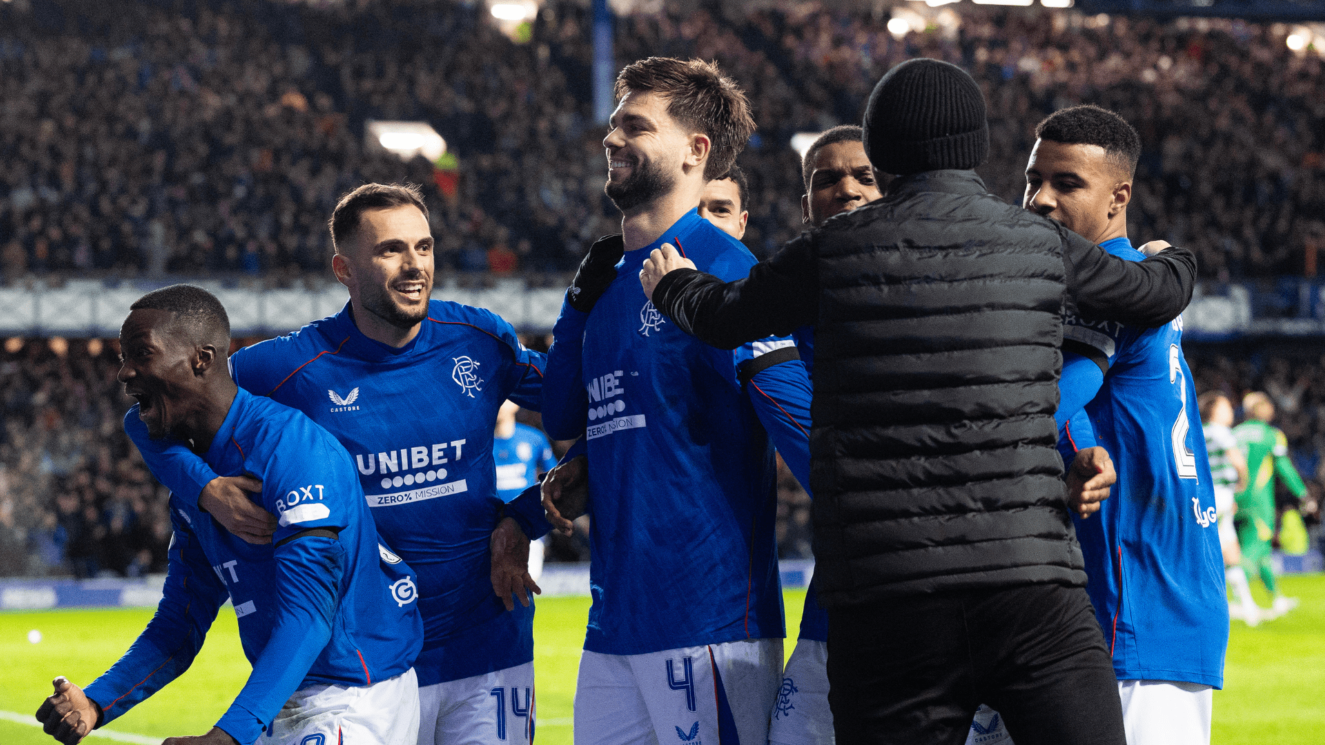 Moment Rangers hero takes fan's hat and wears it for wild celebrations after goal against Celtic at Ibrox