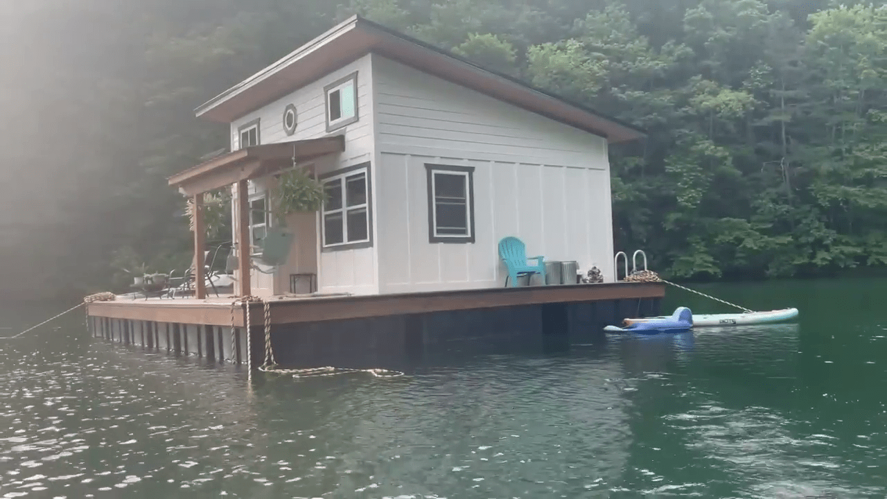 We live in a two-storey floating home on a lake - it's nothing like a boat, and only costs us £2k each year